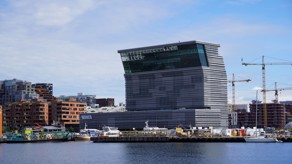 a building next to a body of water