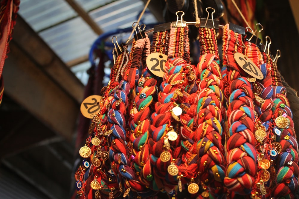 a group of colorful necklaces