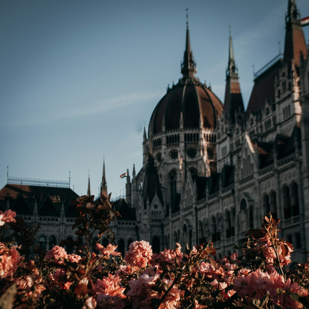 a large building with a dome and towers