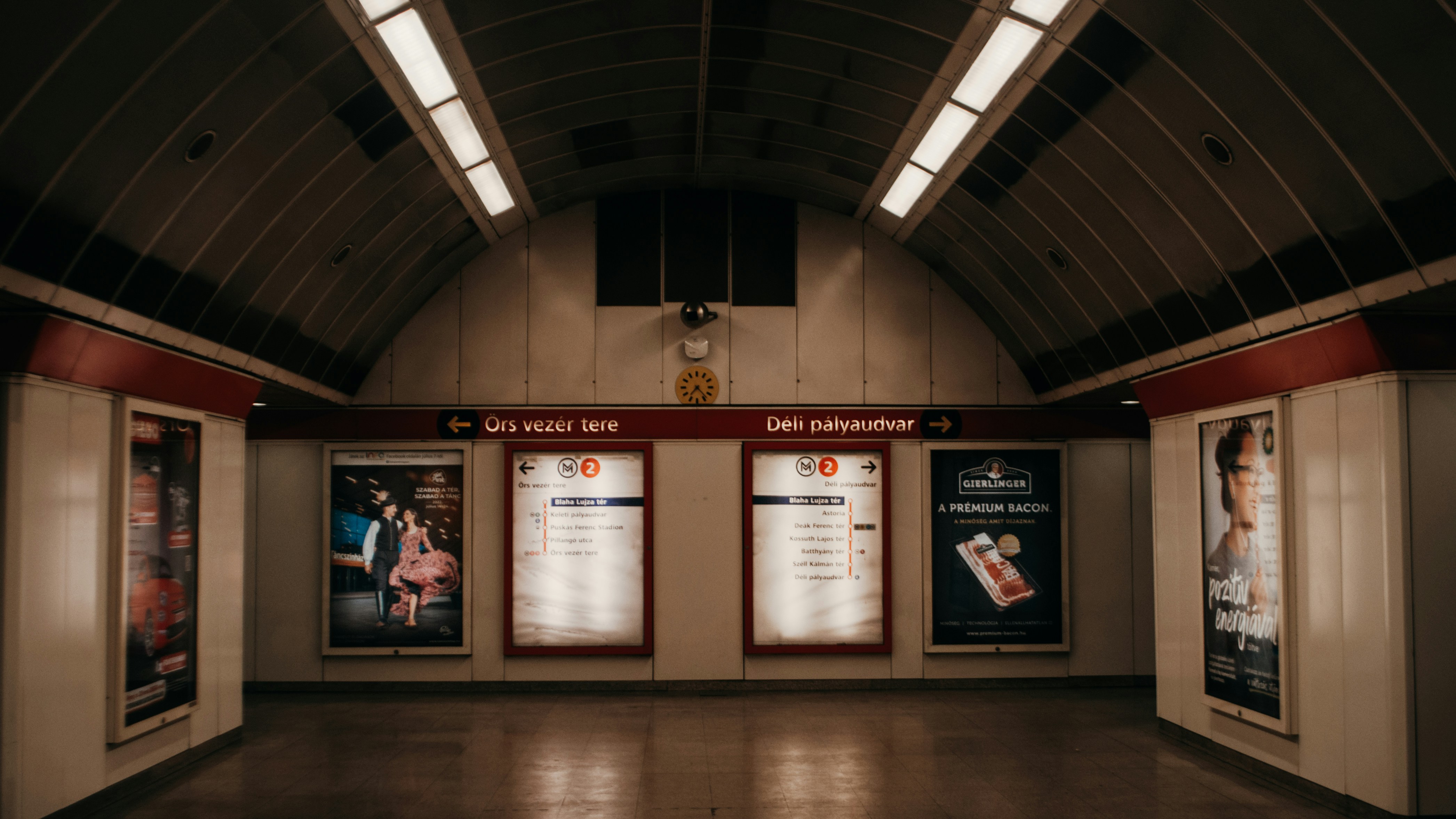 a large room with posters on the wall, 