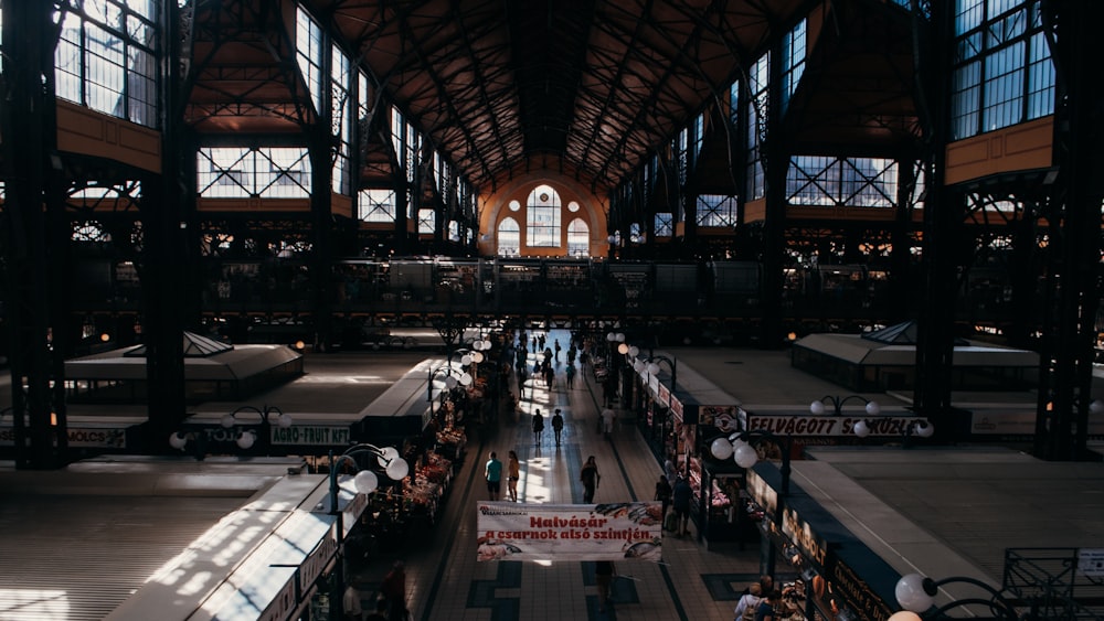 a large room with a large group of people in it