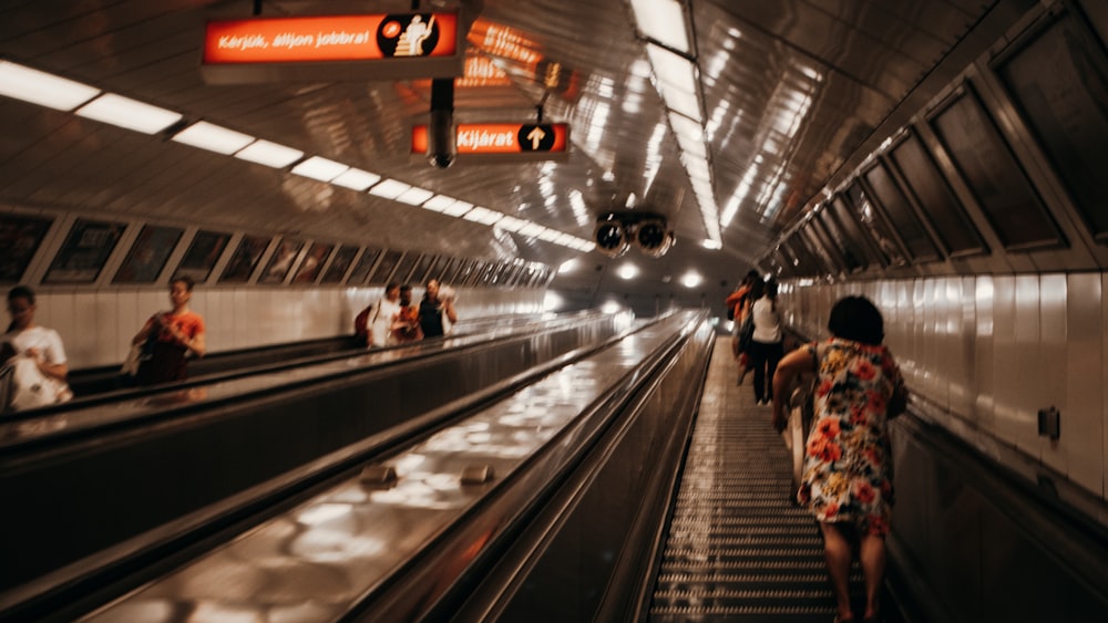 a group of people waiting at a train station