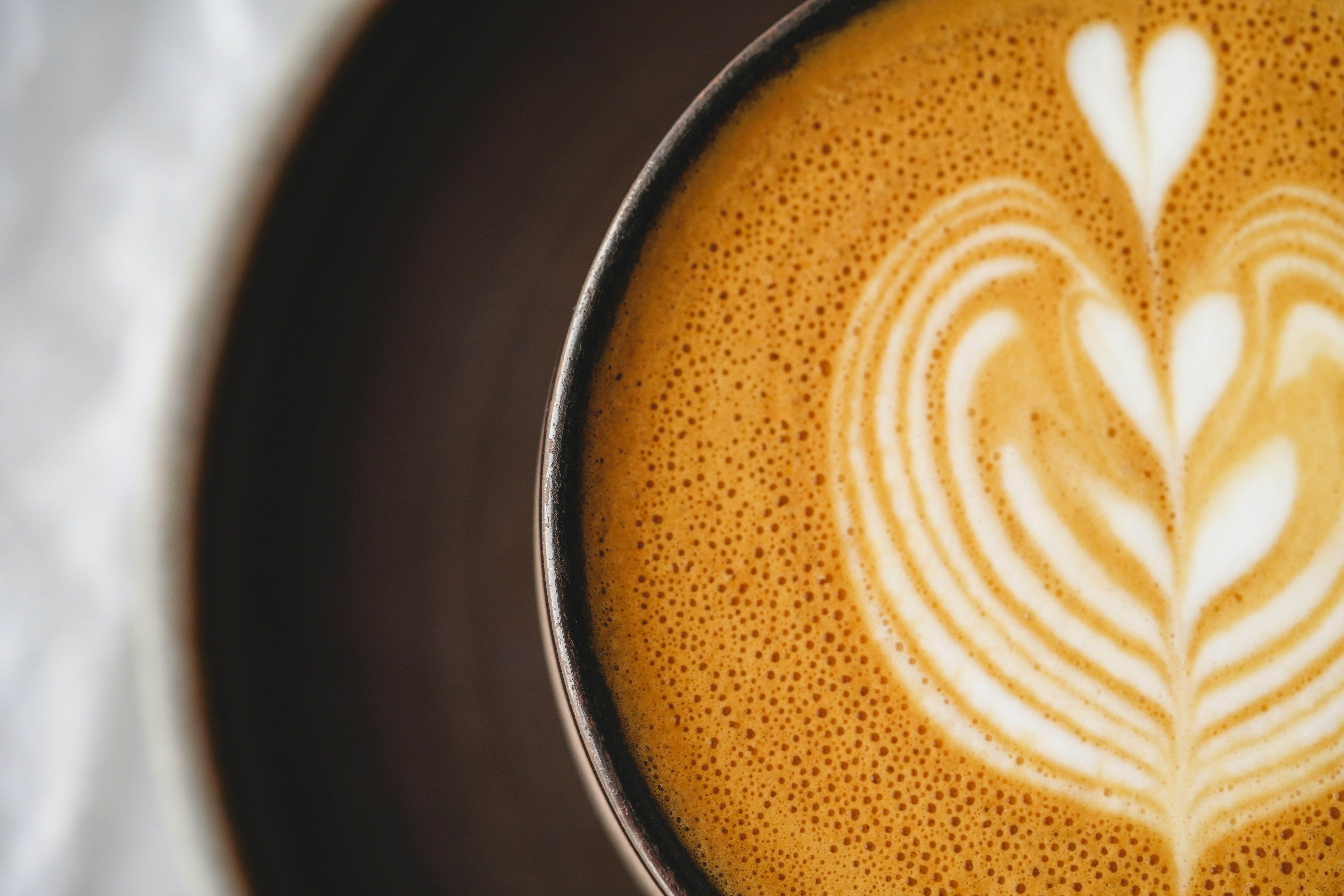 Latte art tulip in white cup