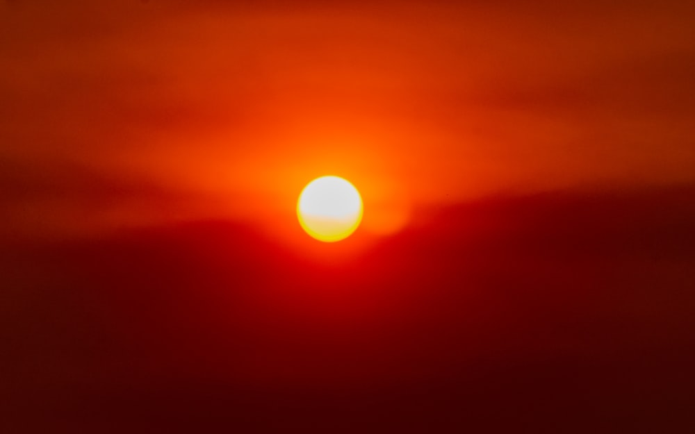 a bright orange sun