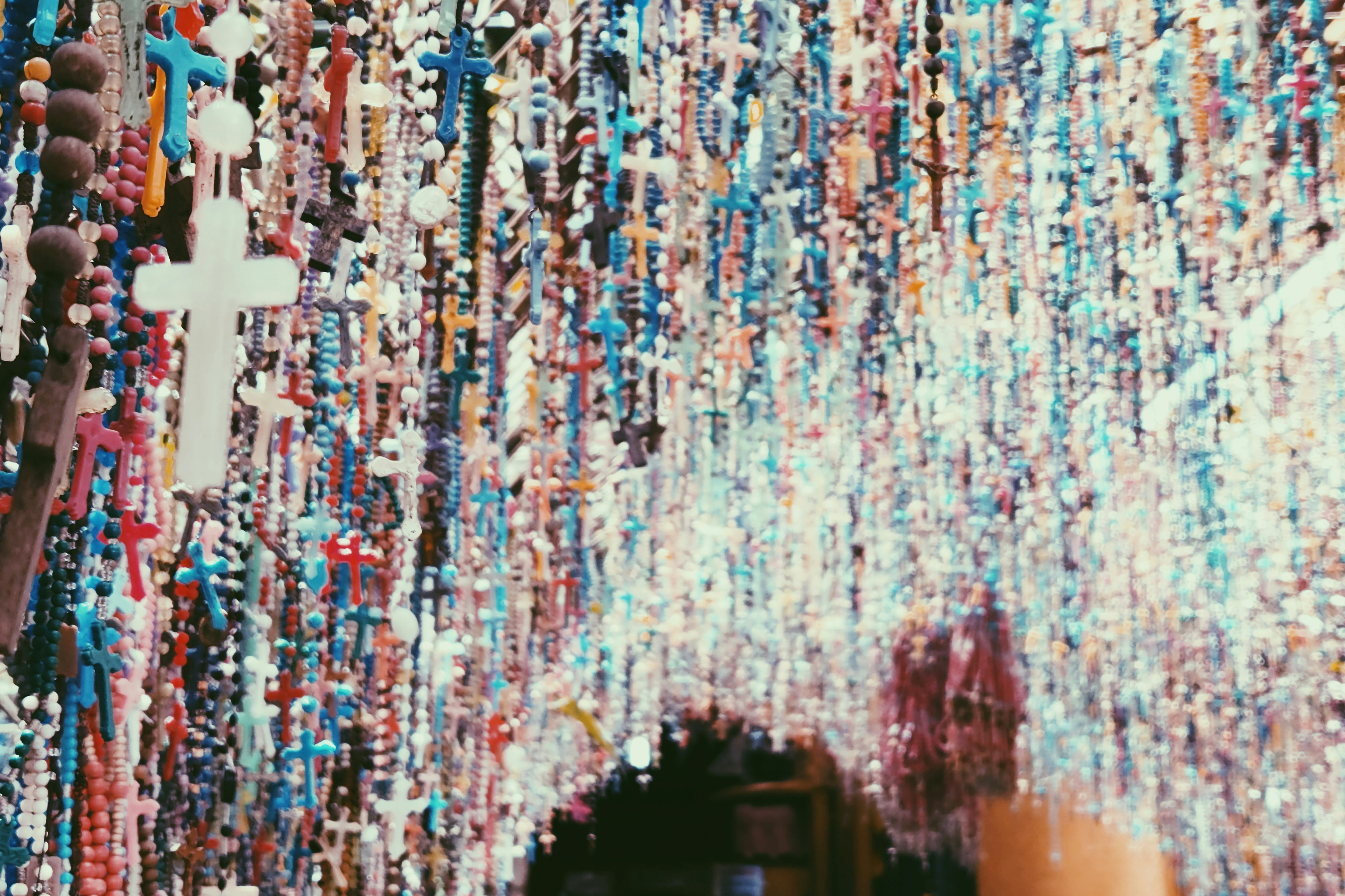 a group of colorful stringed objects