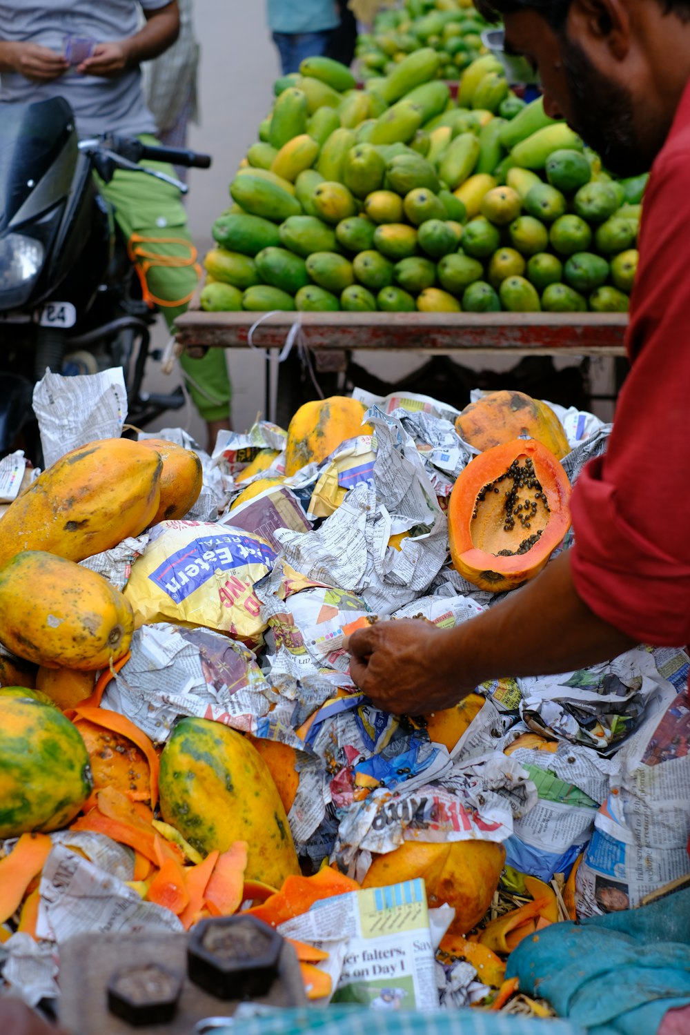 a person holding a plate of fruit