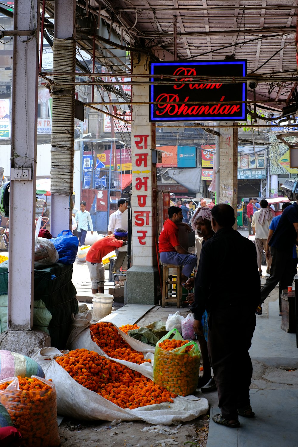 people shopping at a market