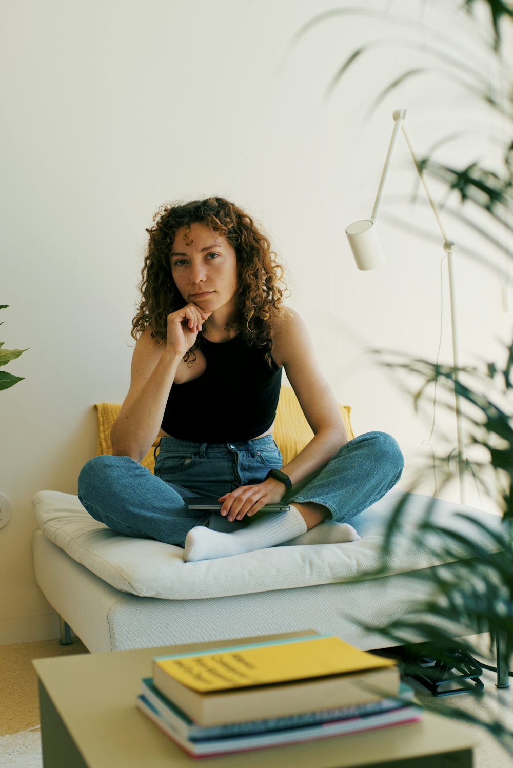 a woman sitting on a couch