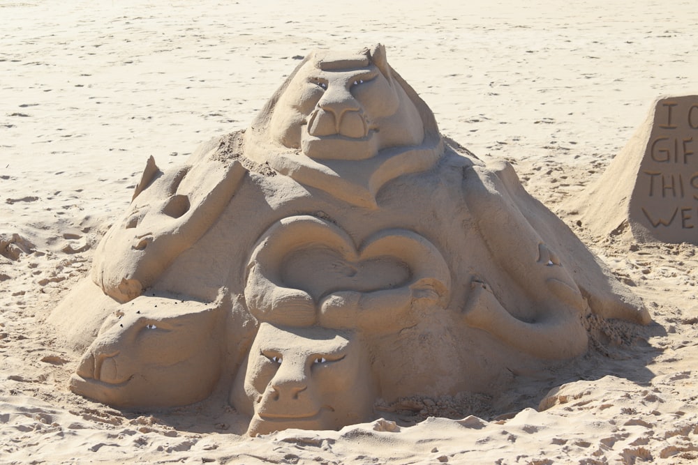 a sand sculpture of a lion