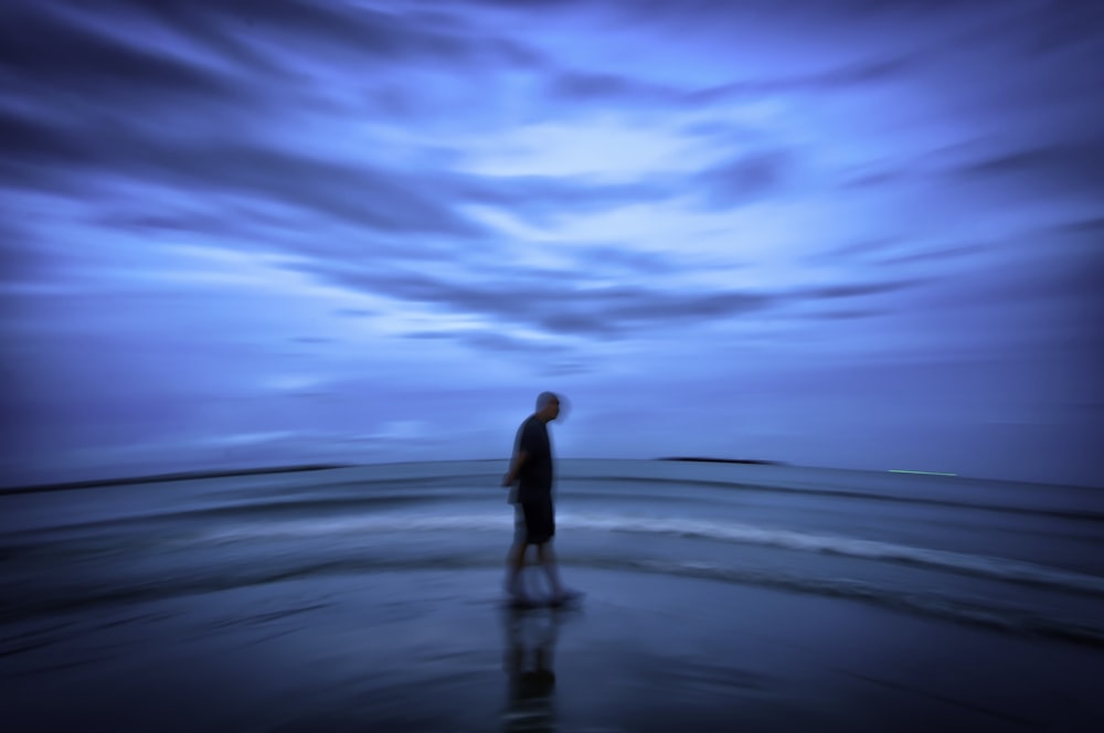 a person walking on a beach