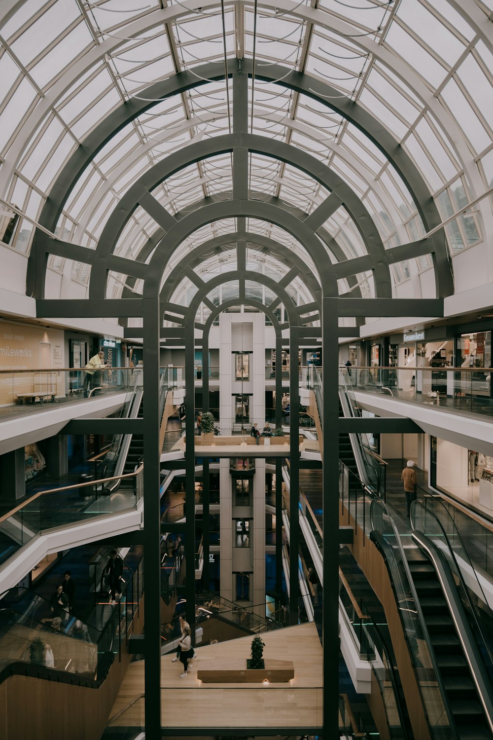 a large building with glass stairs