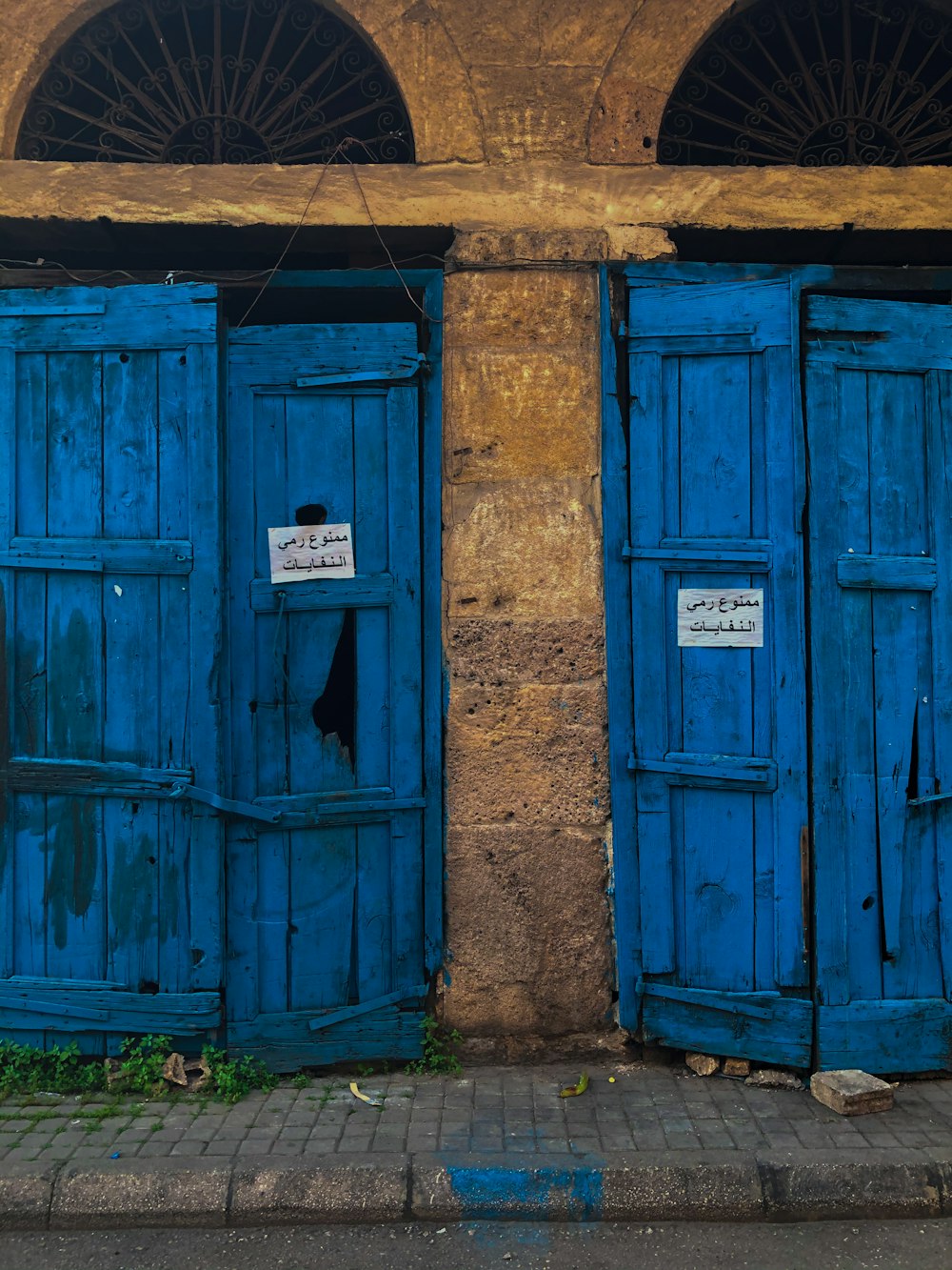 a couple of blue doors