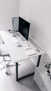 Focused professional working at a neat desk with minimal distractions.