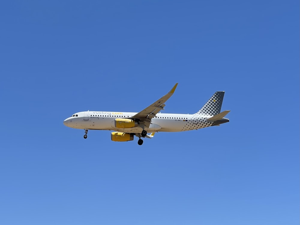 a large airplane flies through the air