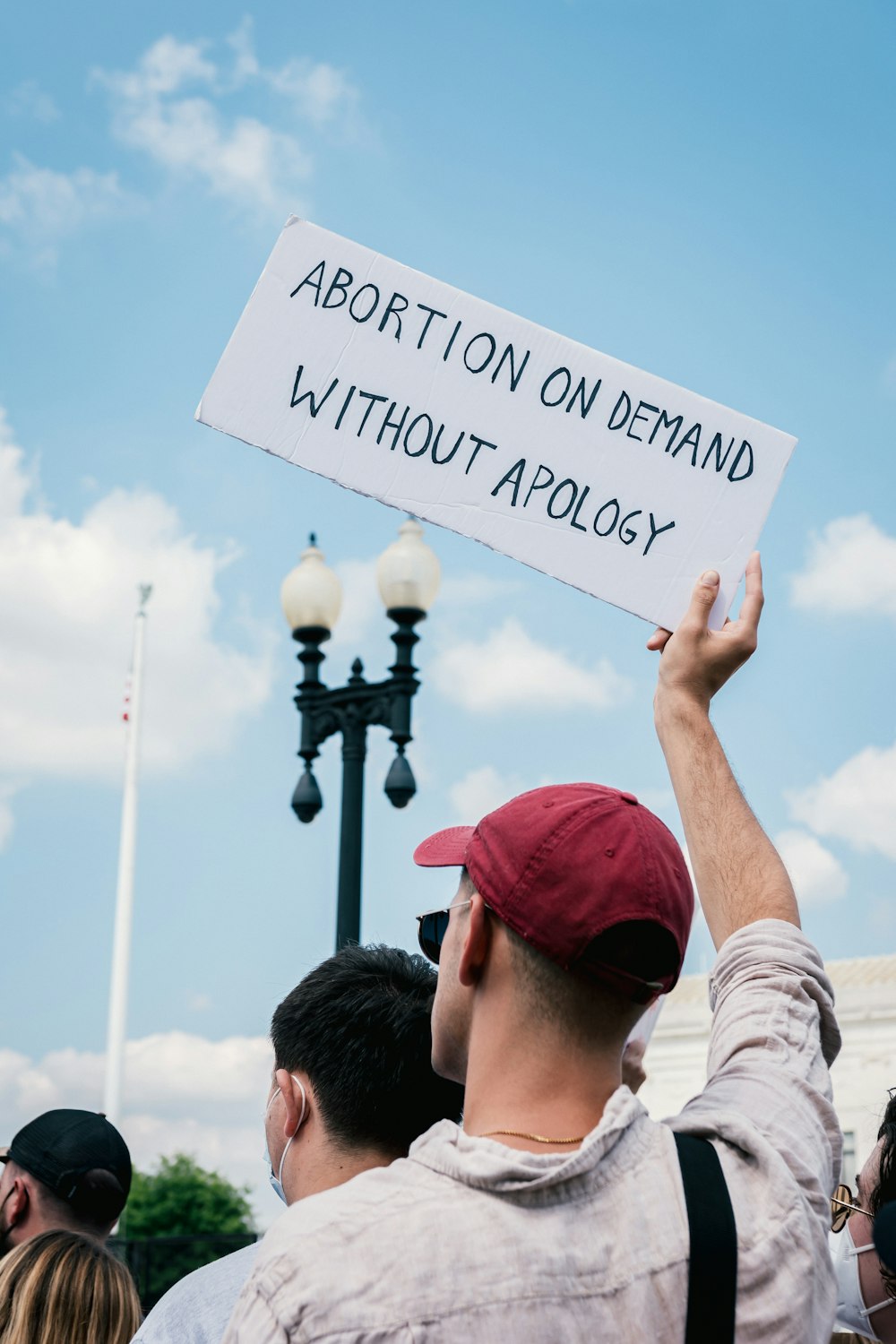 a man holding a sign