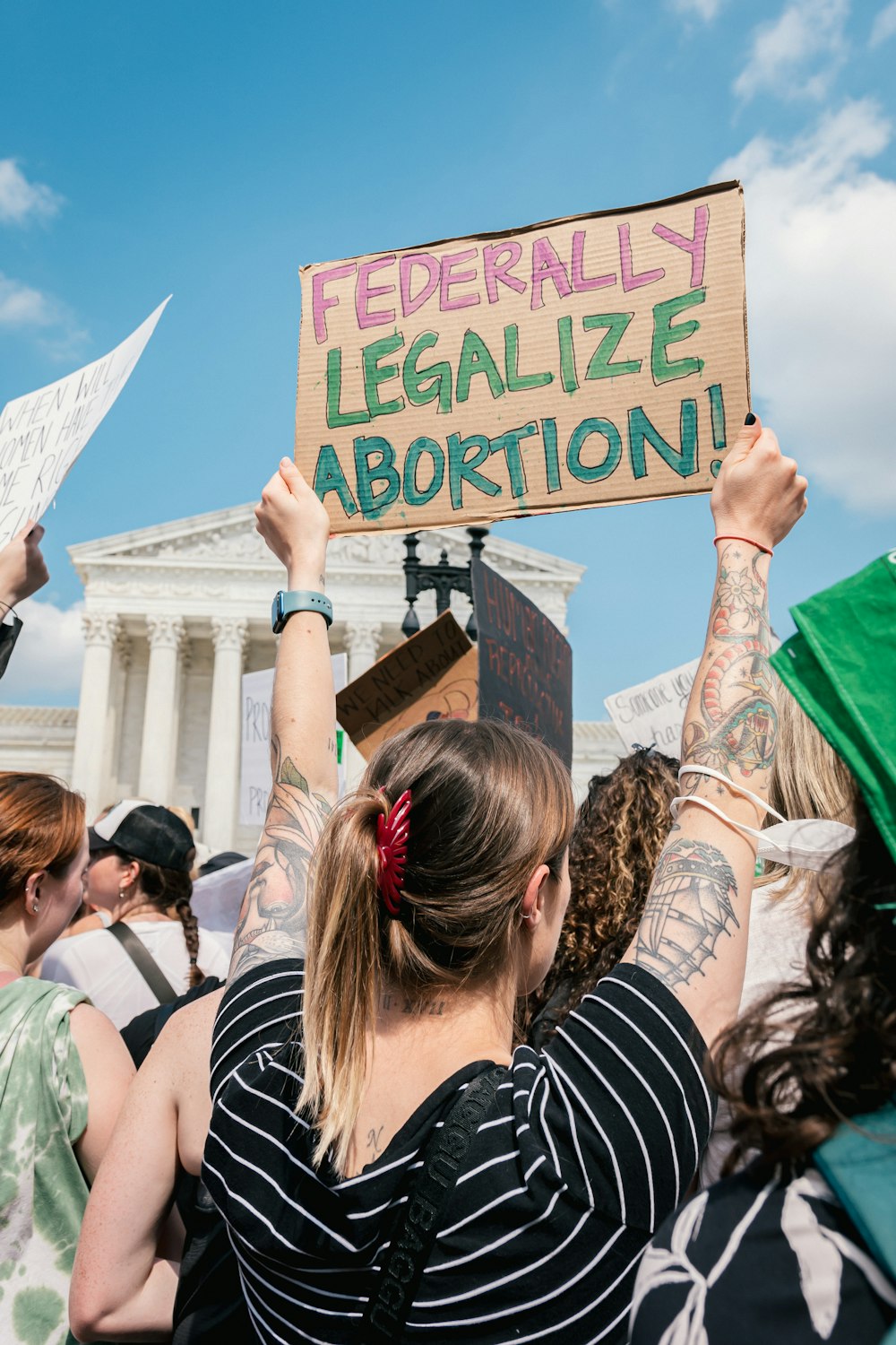 a man holding a sign