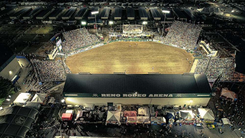 a large stadium with a field and a large crowd