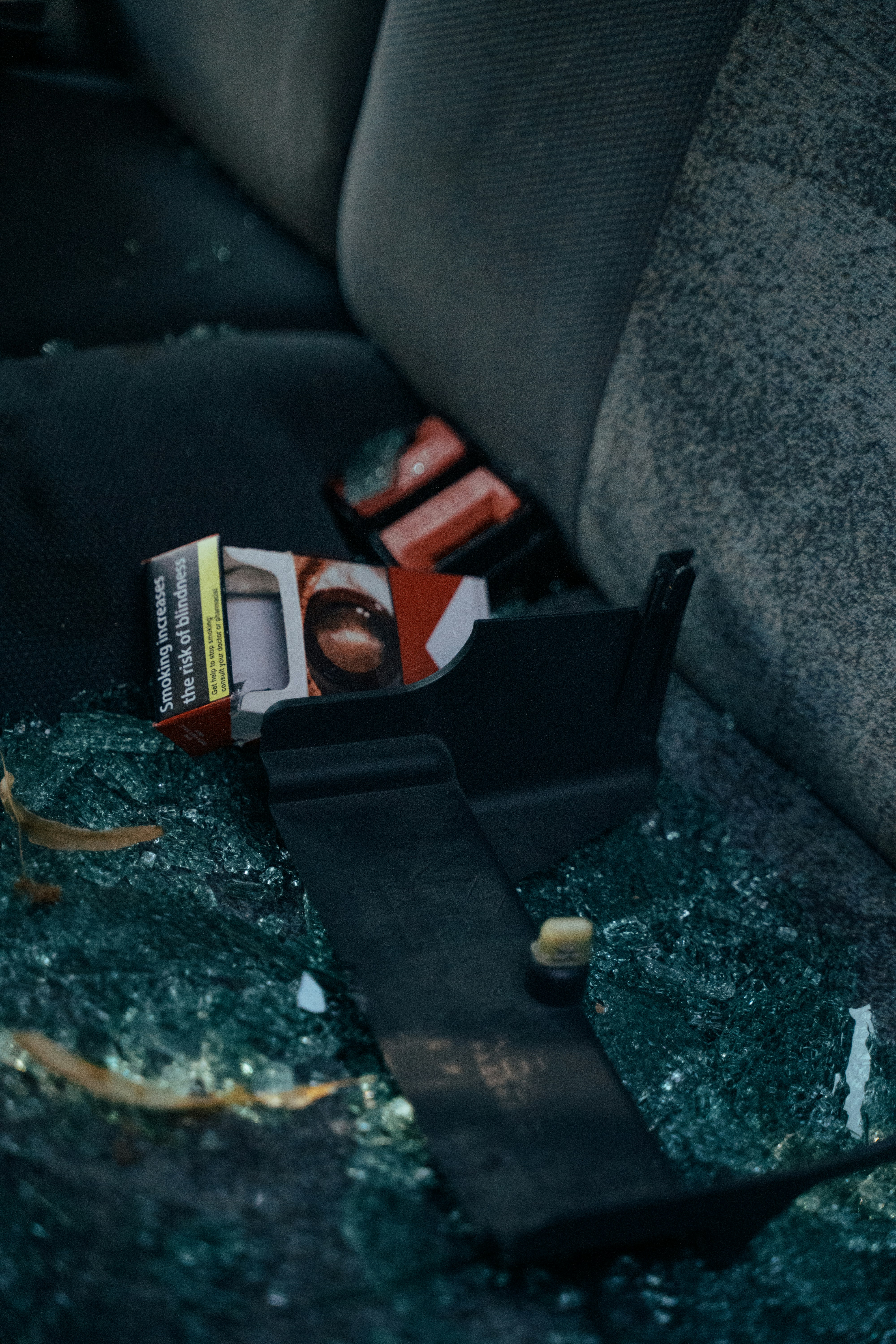 a box of cigarettes on a car seat