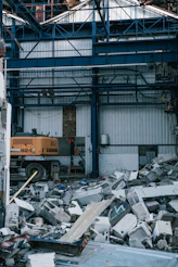 a construction vehicle in front of a building