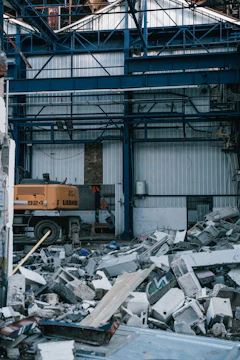 a construction vehicle in front of a building
