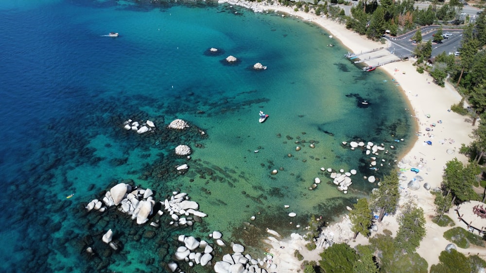 a beach with many boats