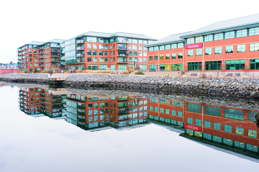 a body of water with buildings along it