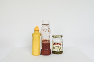 a group of bottles with liquid in them