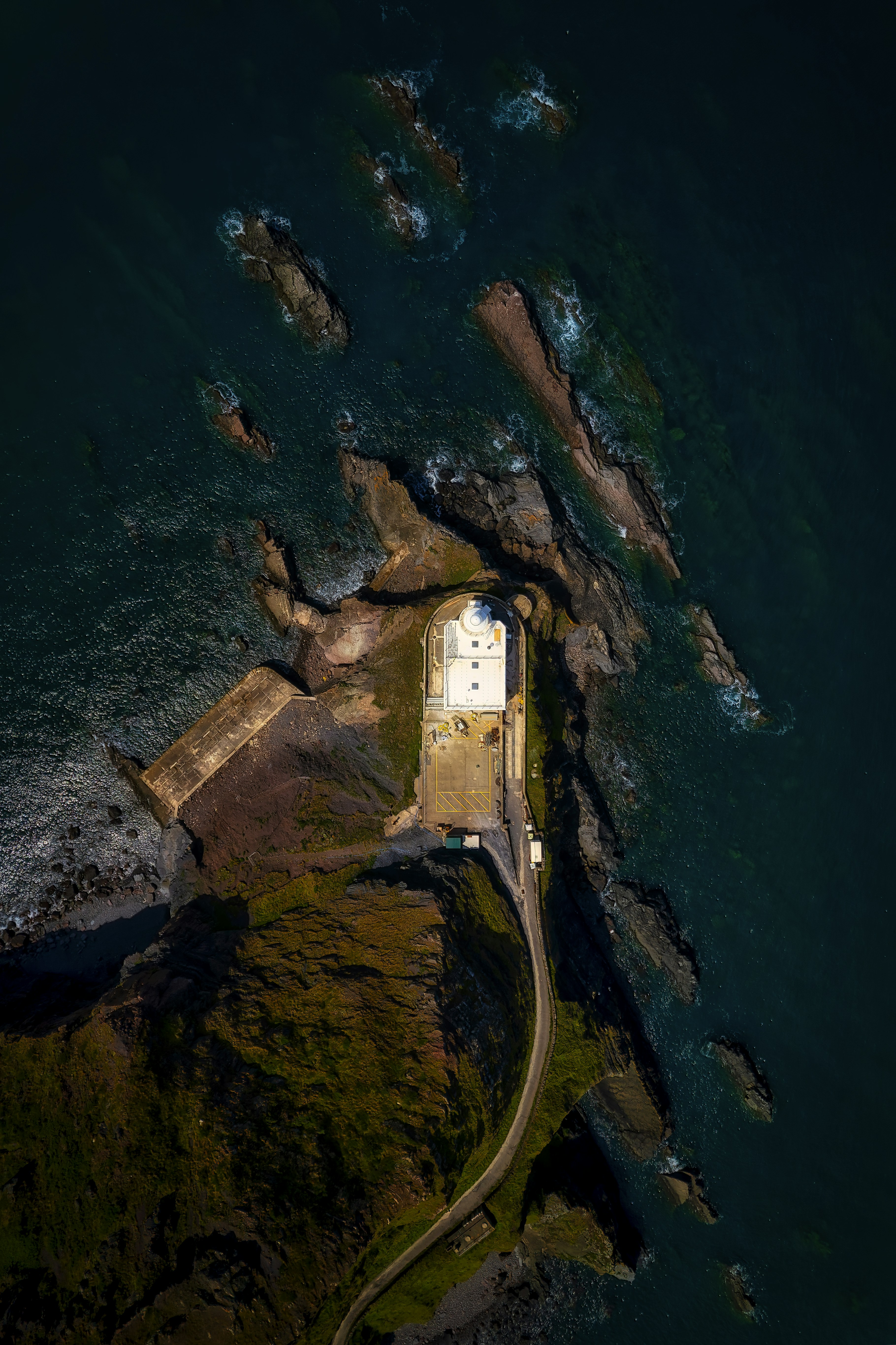 Let There Be Light(house), Let There Be Rock. Top down of Hartland Point Lighthouse in the morning sun, Devon, UK