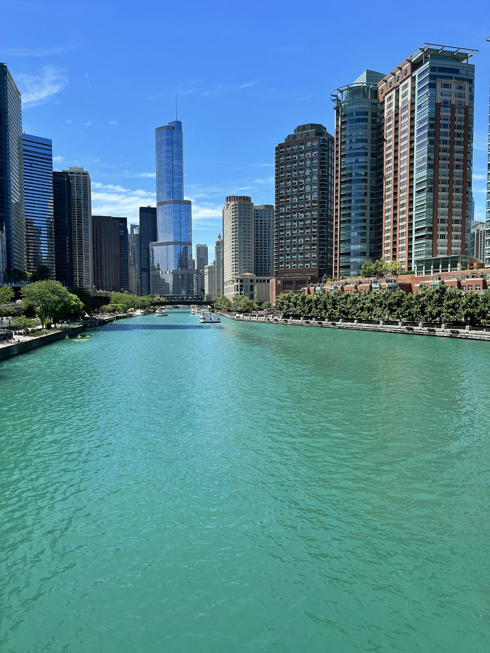 a body of water with a city in the background