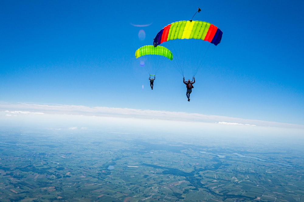 a group of people parachuting