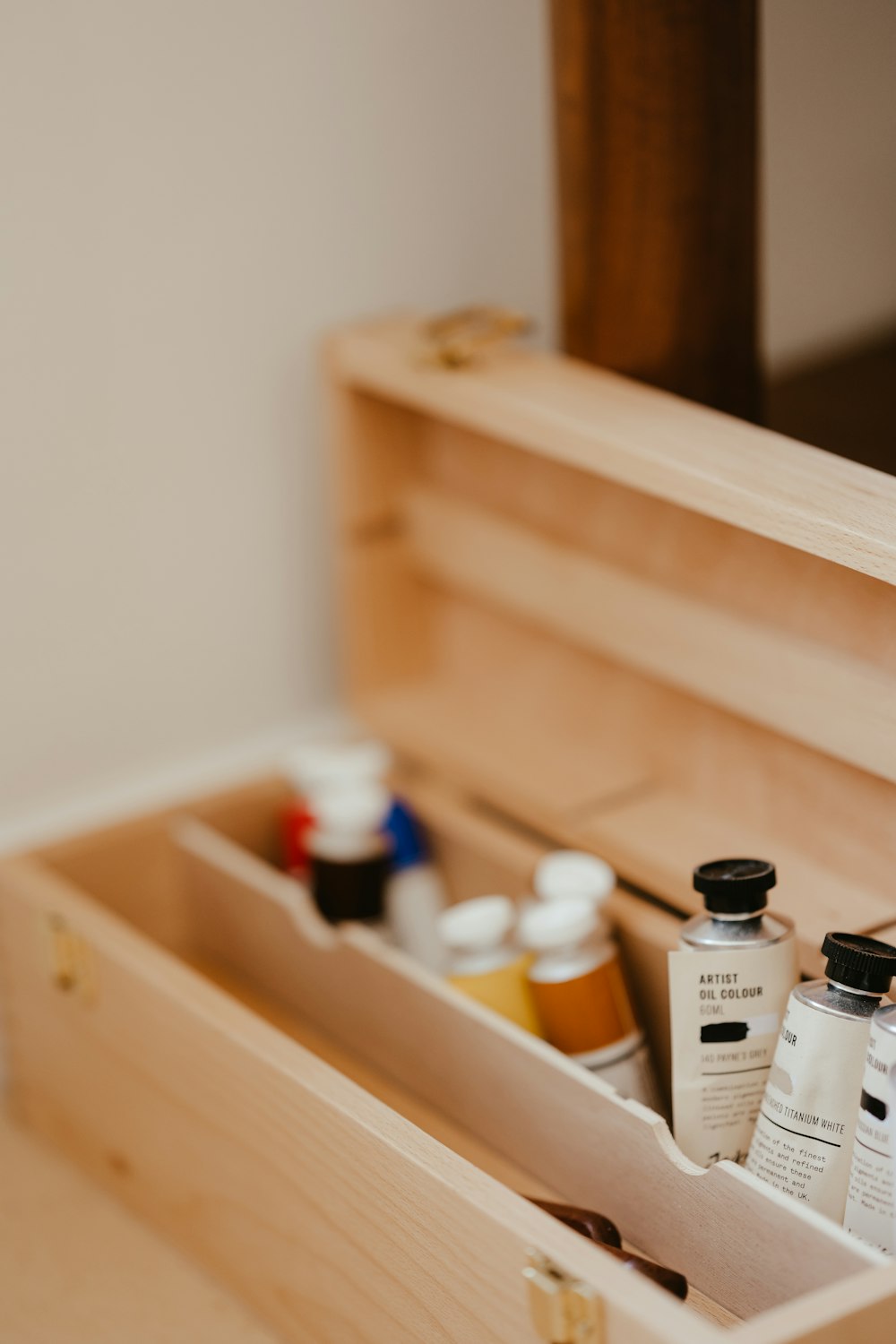 a shelf with bottles of medicine on it