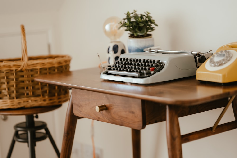 a table with a keyboard and a chair