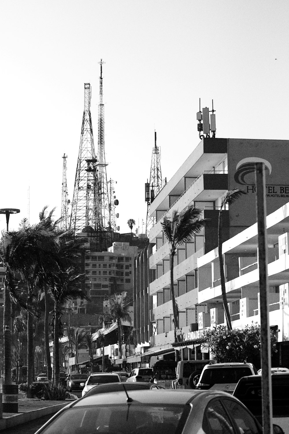 a city street with cars and buildings