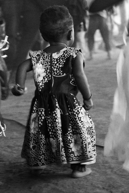 a child wearing a dress
