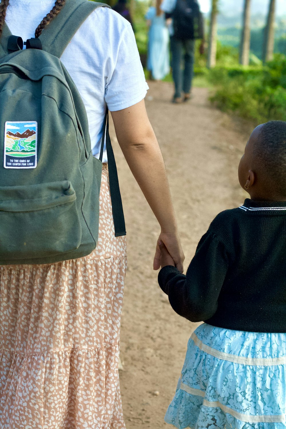 a person holding a child