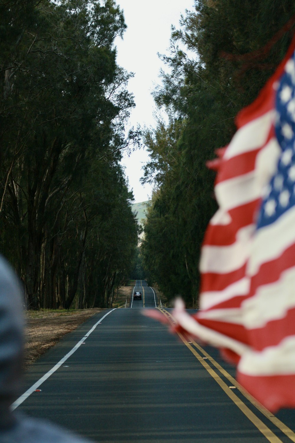 a road with a flag on it