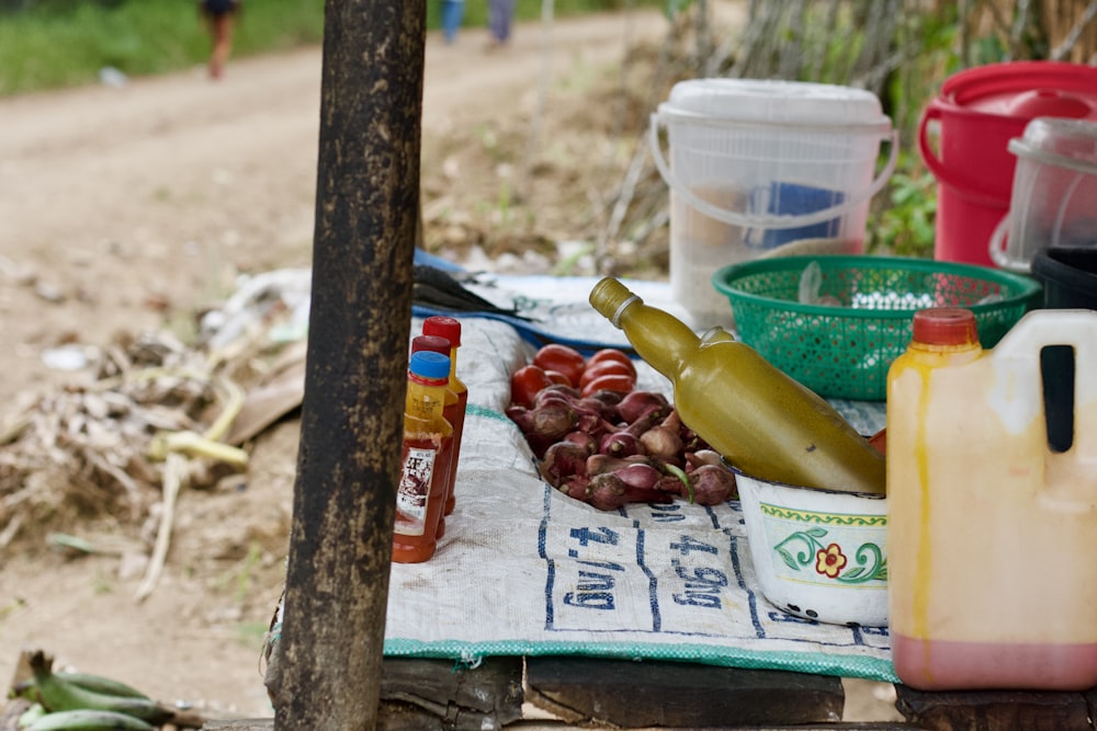 a picnic table with food and drinks