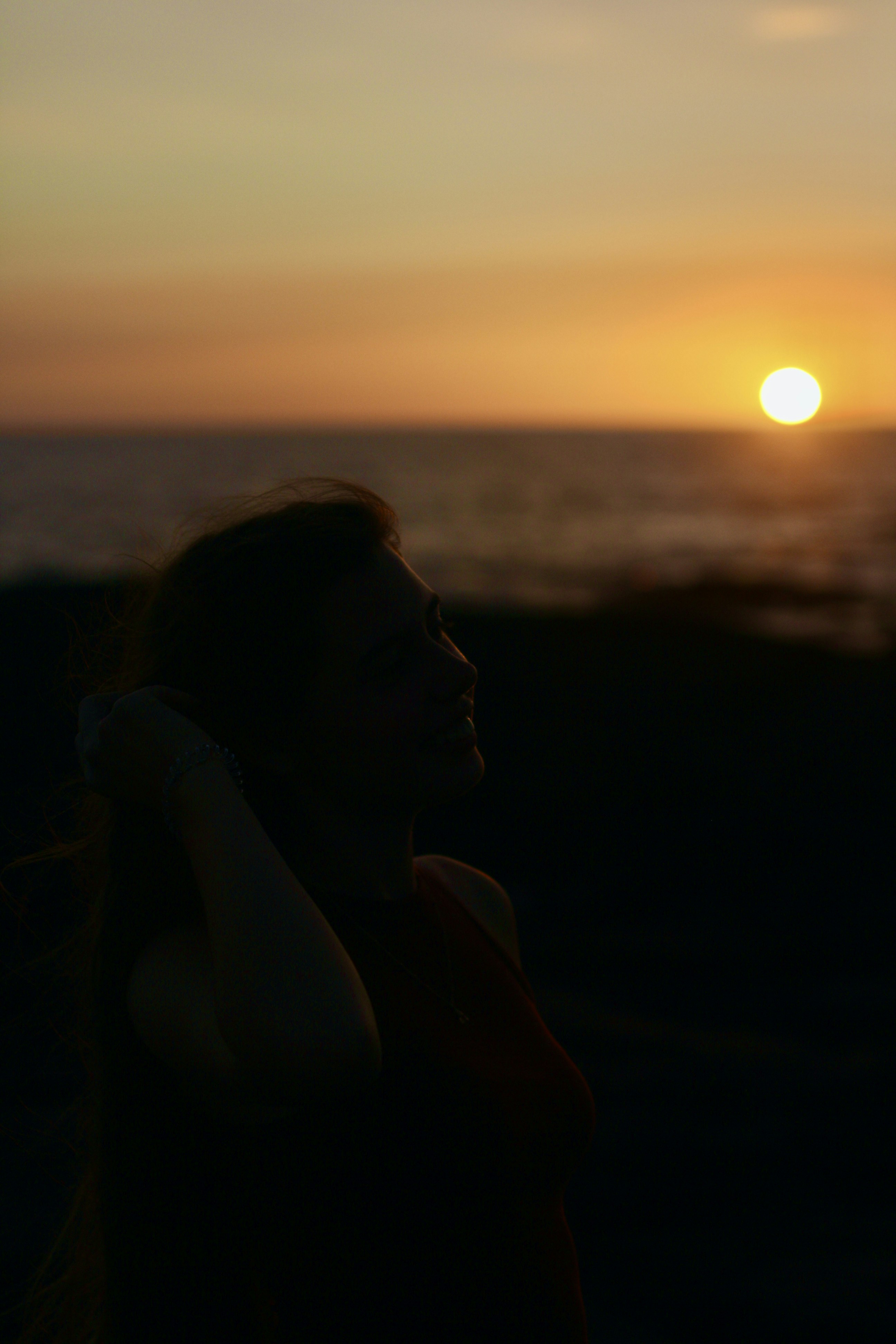 a man looking out over the ocean