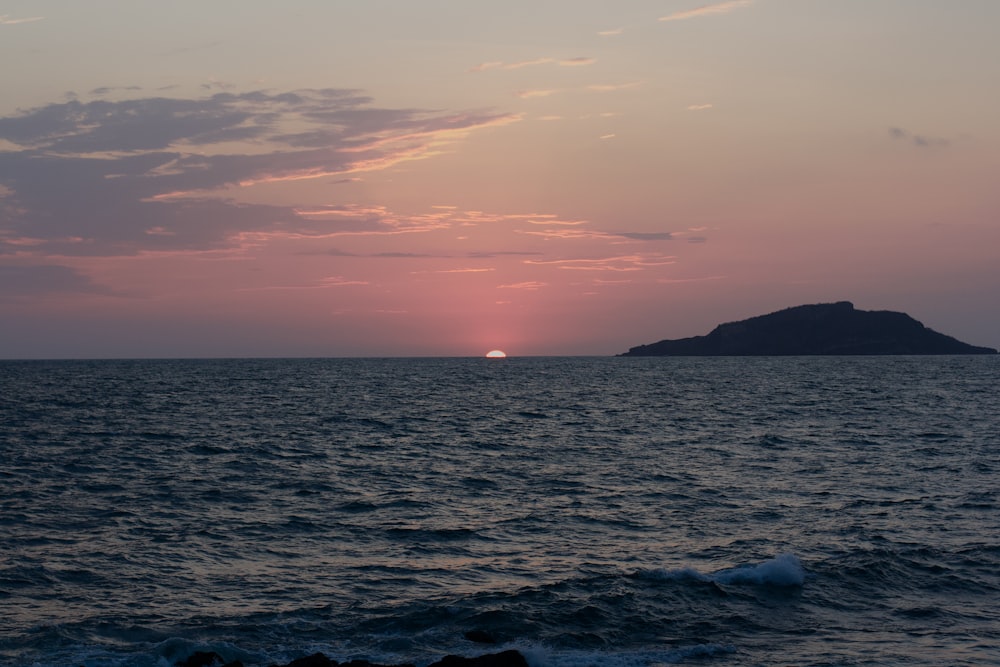 a body of water with a land in the distance