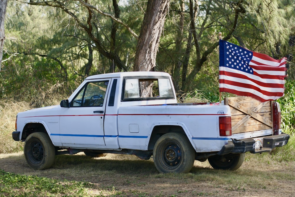 a truck with a flag on the back
