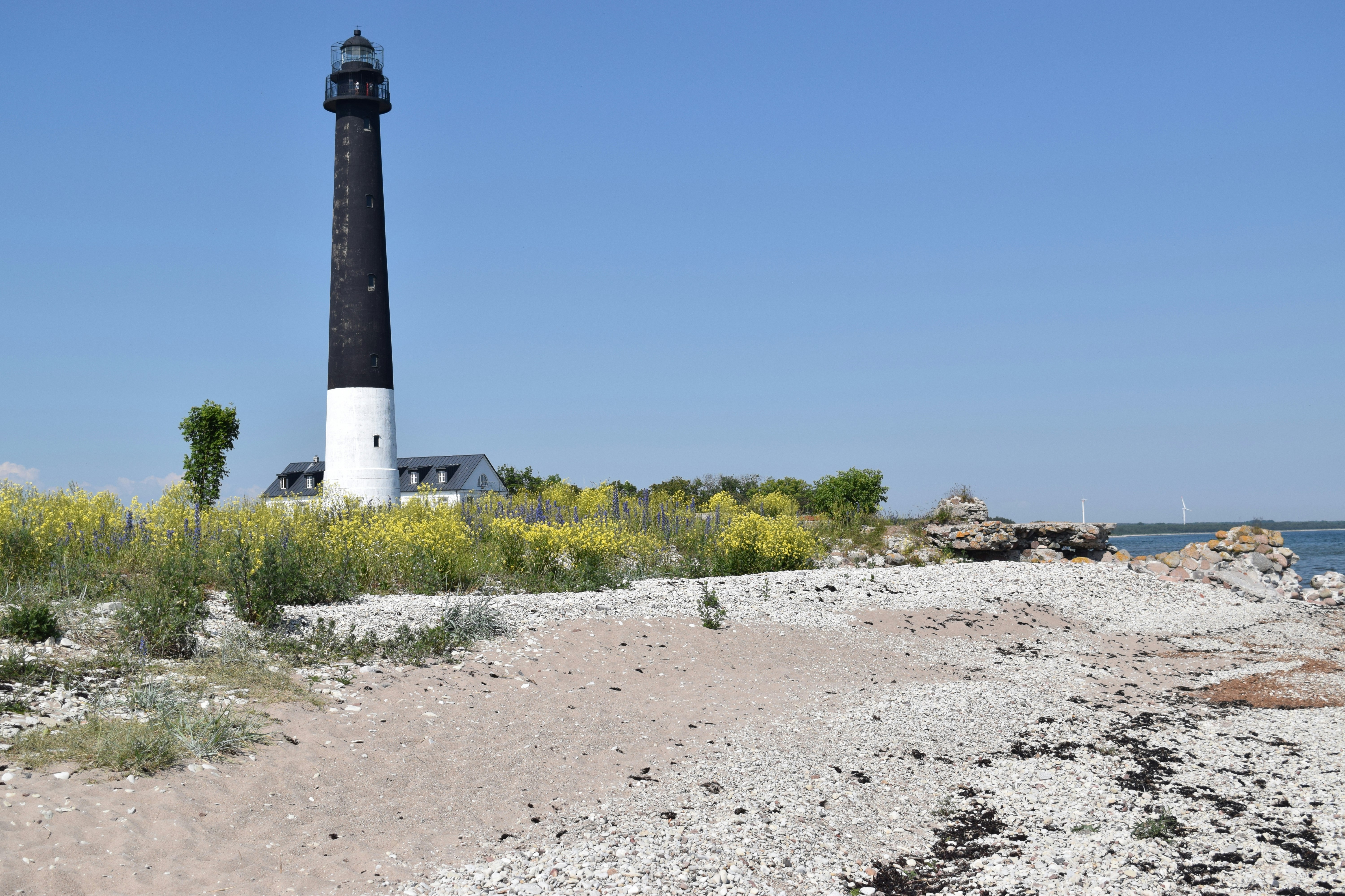 a lighthouse on a beach