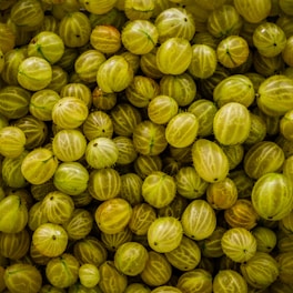 a large pile of yellow fruit