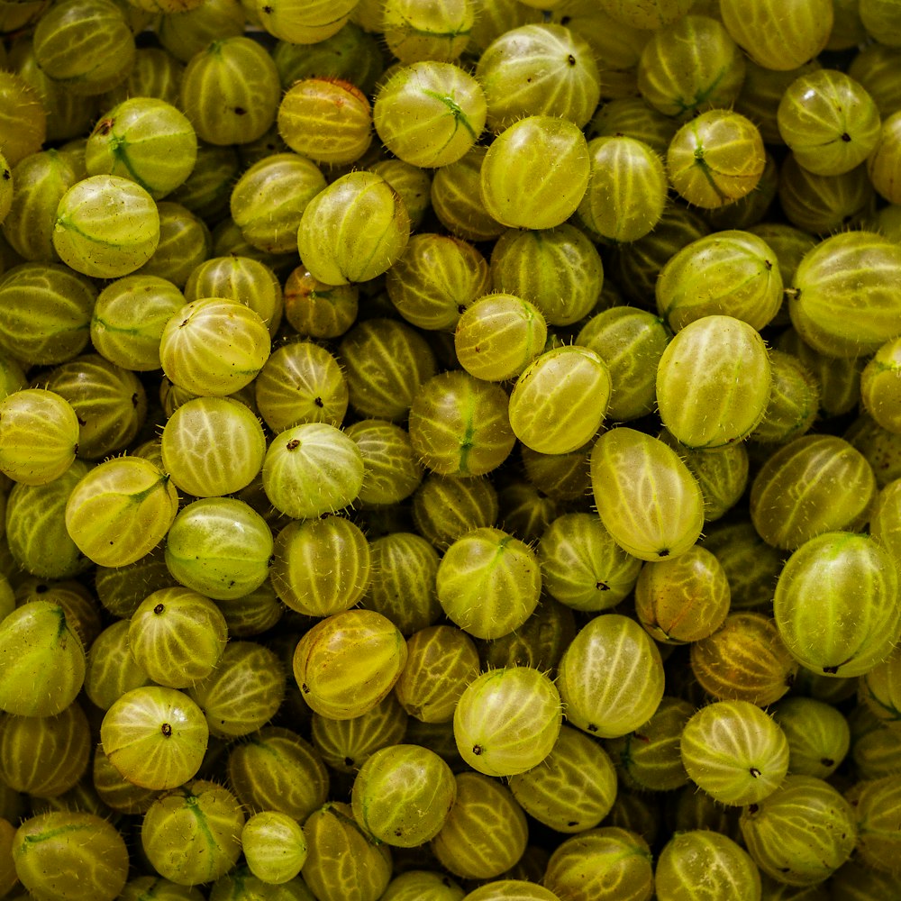 a large pile of yellow fruit