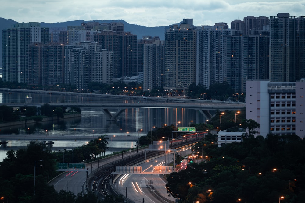 a city with a bridge and a river