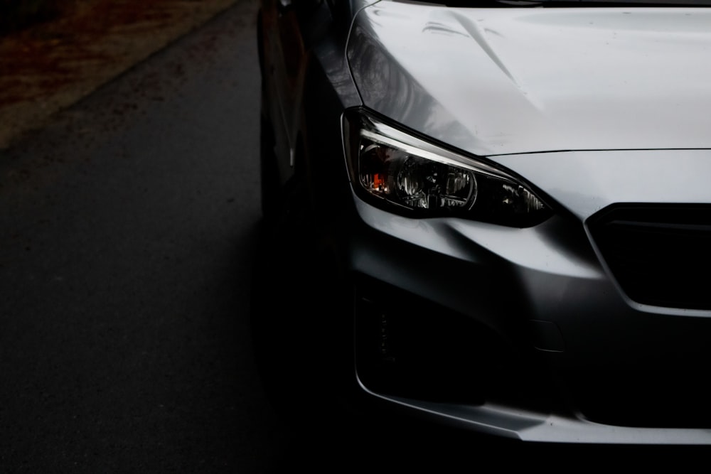 a white car parked on a street