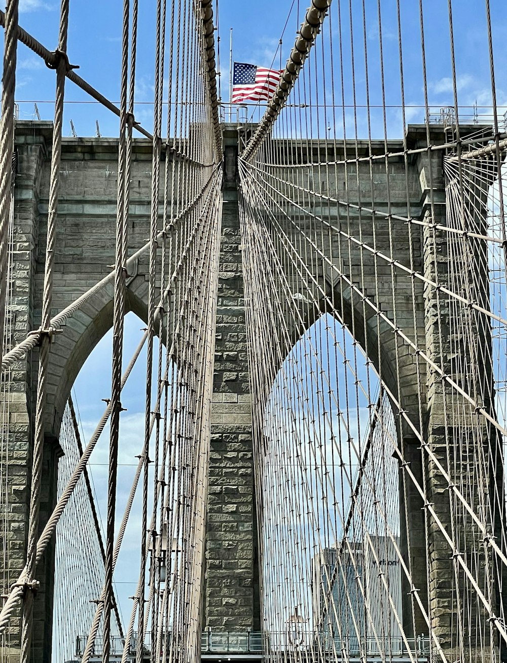 a bridge with flags