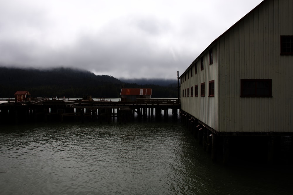 a building next to a body of water