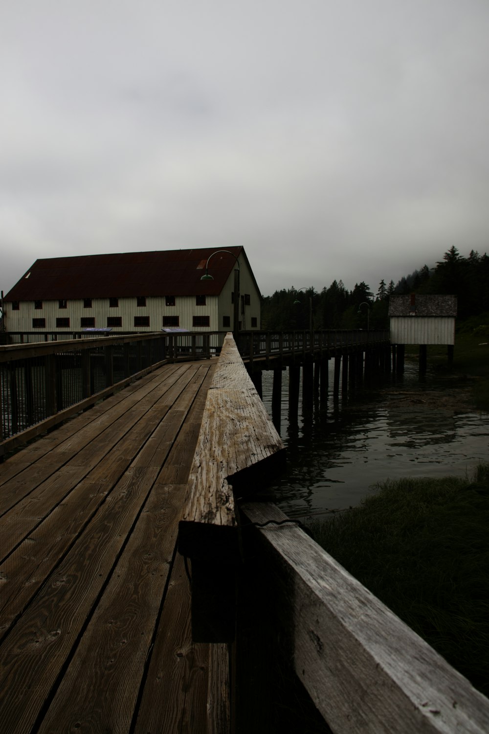 a wooden bridge over water