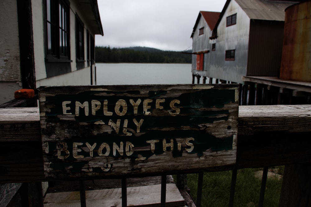 a sign on a fence