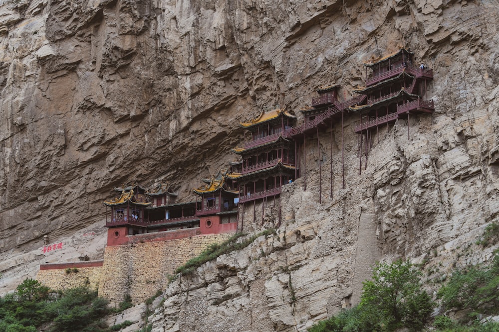 a red building on a cliff